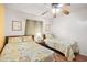 Comfortable bedroom features two beds with matching comforters and a ceiling fan at 6000 N Ocean Blvd. # 131, North Myrtle Beach, SC 29582