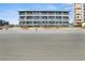 Oceanfront condo building featuring multiple floors of units with balconies and lovely beach views at 6000 N Ocean Blvd. # 131, North Myrtle Beach, SC 29582