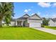 Newly constructed home with a two-car garage and spacious yard at 85 Millsite Ct., Georgetown, SC 29440