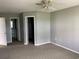 Comfortable bedroom offering a ceiling fan, closet, and convenient access to a bathroom at 5020 Windsor Green Way # 103, Myrtle Beach, SC 29579