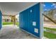 Outdoor shower on the ground level features blue siding and is perfect for rinsing off after the beach at 721 10Th Ave. S, Surfside Beach, SC 29575