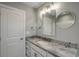 Stylish bathroom with white vanity, granite countertop, updated fixtures, and modern vanity lighting at 723 10Th Ave. S, Surfside Beach, SC 29575