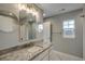 Stylish bathroom featuring a modern vanity, granite countertop, updated fixtures, and modern vanity lighting at 723 10Th Ave. S, Surfside Beach, SC 29575