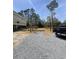 New construction home with a foundation being built in a neighborhood with a truck at 723 10Th Ave. S, Surfside Beach, SC 29575