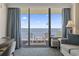 Enjoy panoramic ocean views from the balcony, accessible from a well-appointed living space with comfortable seating at 1105 S Ocean Blvd. # 904, Myrtle Beach, SC 29577