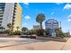 Exterior signage featuring 'Coral Beach' amenities, including bowling, recreation, restaurants, bars, and 10 pools at 1105 S Ocean Blvd. # 904, Myrtle Beach, SC 29577