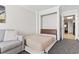 A cozy living room with a pull-down murphy bed, a comfortable couch, and a view into another room at 1105 S Ocean Blvd. # 904, Myrtle Beach, SC 29577