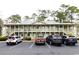 Exterior view of a building with ample parking spaces at 1131 White Tree Ln. # 31-J, Myrtle Beach, SC 29588