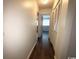 Clean and bright hallway with light walls and wood-look flooring at 10301 N Kings Highway # 15-8, Myrtle Beach, SC 29572