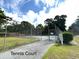 Tennis court with surrounding trees at 10301 N Kings Highway # 15-8, Myrtle Beach, SC 29572