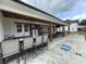 Outdoor patio with bar, hot tub, and backyard games at 206 Green Lake Dr., Myrtle Beach, SC 29572