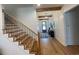 Modern staircase with black metal railing and light wood steps at 206 Green Lake Dr., Myrtle Beach, SC 29572