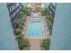 Aerial view of community pool with lounge seating at 6804 N Ocean Blvd. # 1037, Myrtle Beach, SC 29572