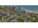 Aerial view of a beachfront resort featuring palm trees, and ocean views at 6804 N Ocean Blvd. # 1037, Myrtle Beach, SC 29572