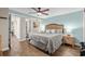 Relaxing bedroom featuring a king bed and an ensuite bathroom at 6804 N Ocean Blvd. # 1037, Myrtle Beach, SC 29572