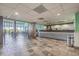 Hotel lobby with tiled floors, welcome desk, ocean views and plenty of seating at 6804 N Ocean Blvd. # 1037, Myrtle Beach, SC 29572