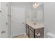 Clean bathroom with vanity, toilet, and shower/tub combo at 103 Palmetto Green Dr. # 103, Longs, SC 29568