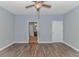 Bright bedroom with ceiling fan, hardwood floors and access to bathroom at 103 Palmetto Green Dr. # 103, Longs, SC 29568