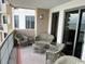 Spacious outdoor balcony with wicker seating, a table and an ocean view at 8500 Margate Circle # 2005, Myrtle Beach, SC 29572
