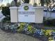 The Margate Tower sign with flower bed at 8500 Margate Circle # 2005, Myrtle Beach, SC 29572