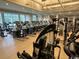 Community gym features rows of cardio machines and natural light at 8500 Margate Circle # 2005, Myrtle Beach, SC 29572