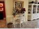 Home office nook with white desk, chair, hutch, and decorative accents at 8500 Margate Circle # 2005, Myrtle Beach, SC 29572