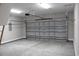 Spacious two-car garage featuring a concrete floor and an automatic door at Tbd 6 Privetts Rd., Conway, SC 29526