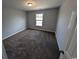 Serene bedroom with neutral walls, carpet, and natural light streaming through the window at Tbd 9 Privetts Rd., Conway, SC 29526