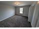 Cozy bedroom with gray carpet, neutral walls, natural light, and a double door closet at Tbd 9 Privetts Rd., Conway, SC 29526