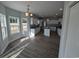 Open kitchen with white cabinets, granite countertops, stainless appliances, and island with seating at Tbd 9 Privetts Rd., Conway, SC 29526