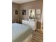 Bedroom with a white dresser, mirror, and coastal-themed décor enhancing the room's style at 9621 Shore Dr. # J-229, Myrtle Beach, SC 29572