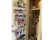 Pantry shows extensive storage with door mounted shelves and neatly organized goods at 9621 Shore Dr. # J-229, Myrtle Beach, SC 29572