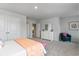Spacious bedroom with light carpet, large closets, and modern decor at 121 Fair Meadow Ct., Loris, SC 29569