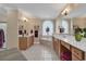Spacious bathroom with a soaking tub, double vanities, and a well-lit vanity area at 816 Waterton Ave., Myrtle Beach, SC 29579