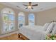 Bright bedroom with large windows offering scenic views, paired with cozy decor at 816 Waterton Ave., Myrtle Beach, SC 29579