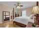 Comfortable bedroom with a four-poster bed, hardwood floors, and a tranquil ambiance at 816 Waterton Ave., Myrtle Beach, SC 29579