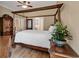 Spacious bedroom featuring a decorative wood bed frame, hardwood floors, and neutral walls at 816 Waterton Ave., Myrtle Beach, SC 29579