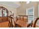 Bright dining room with a large wooden table and a decorative hutch, perfect for formal meals at 816 Waterton Ave., Myrtle Beach, SC 29579