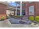 Elegant entrance with brick steps, iron railing and lush landscaping at 816 Waterton Ave., Myrtle Beach, SC 29579