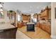 Kitchen featuring custom wood cabinets, tile flooring, and large center island at 816 Waterton Ave., Myrtle Beach, SC 29579