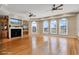 Spacious living room filled with natural light, featuring a fireplace and hardwood flooring at 816 Waterton Ave., Myrtle Beach, SC 29579