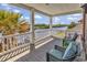 Comfortable porch with scenic waterfront views and wicker seating at 816 Waterton Ave., Myrtle Beach, SC 29579