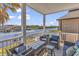 Relaxing porch with waterfront view and comfortable seating at 816 Waterton Ave., Myrtle Beach, SC 29579