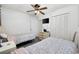 Comfortable bedroom featuring twin beds, ceiling fan and closet at 9600 Shore Dr. # A-102, Myrtle Beach, SC 29572