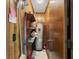 Utility area featuring water heater, shelving and storage at 9600 Shore Dr. # A-102, Myrtle Beach, SC 29572