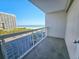 Balcony view showcases oceanfront scenery, high-rise buildings, and inviting beach access at 9820 Queensway Blvd. # 501, Myrtle Beach, SC 29572
