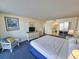 Cozy bedroom with queen bed, dresser, and bathroom access, perfect for relaxation and convenience at 9820 Queensway Blvd. # 501, Myrtle Beach, SC 29572