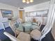 Open dining area with seating for six, adjacent to the kitchen and living spaces for easy entertaining at 9820 Queensway Blvd. # 501, Myrtle Beach, SC 29572