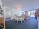 Inviting living room with dining area, balcony access, and comfortable seating, perfect for relaxation at 9820 Queensway Blvd. # 501, Myrtle Beach, SC 29572