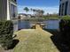 Backyard dock provides direct access to the water and offers a beautiful view of the waterfront community at 220 Landing Rd. # I, North Myrtle Beach, SC 29582